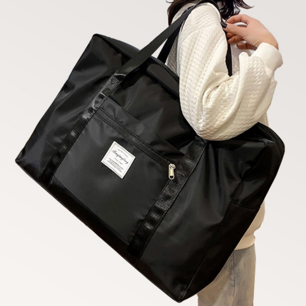 핑크빛 설렘을 담아 떠나는 몽땅겟 접이식 여행용 보스턴백