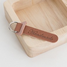 지퍼손잡이가죽