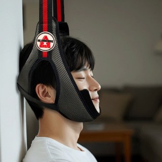 반자동 목견인치료기