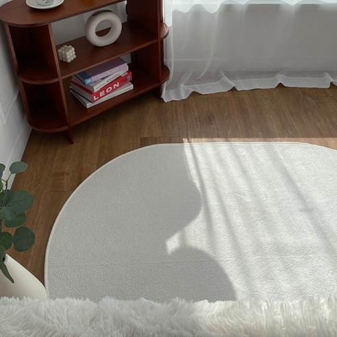 공간에 포근함을 더하는 한스갤러리 타원형 러그