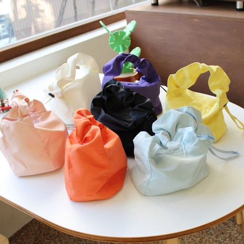 솜사탕처럼 달콤한 매력, 가볍고 사랑스러운 미니 토드백