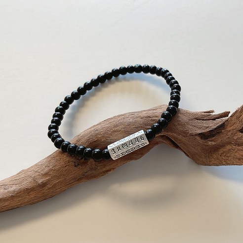 재물의 힘과 영적 의미를 담은 호안석 오닉스 두줄 염주 팔찌