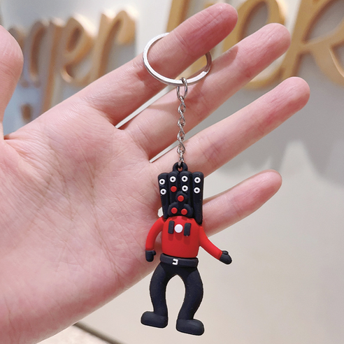 귀엽고 생생한 디자인의 스키비디 토일렛 키링으로 열쇠를 쉽게 관리하고 개성을 더하세요.