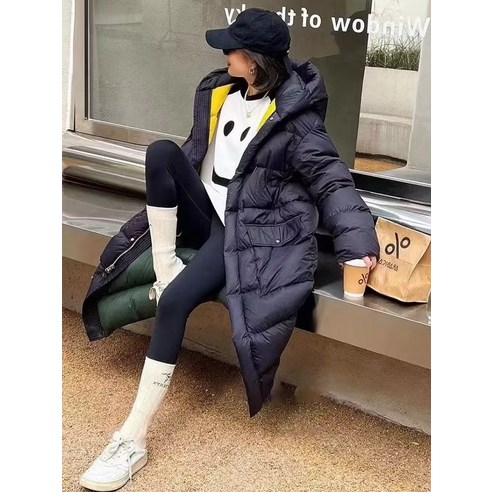 구스다운 모던 롱 겨울 컴포트는 추운 겨울에 따뜻하고 편안하게 입을 수 있는 겨울 코트입니다.