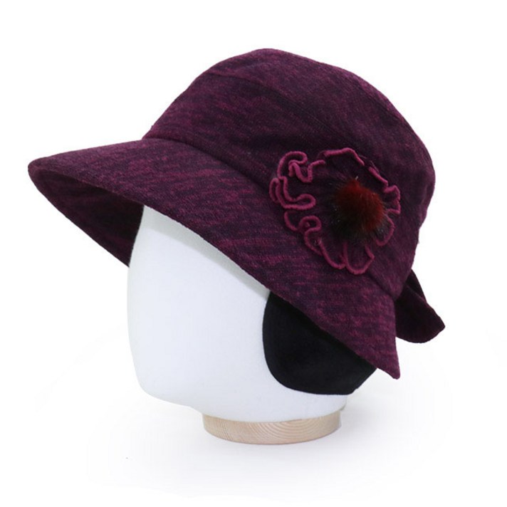 베이직엠 중년 여성 겨울모자 벙거지 귀마개 뭉치코사지 뒷리본